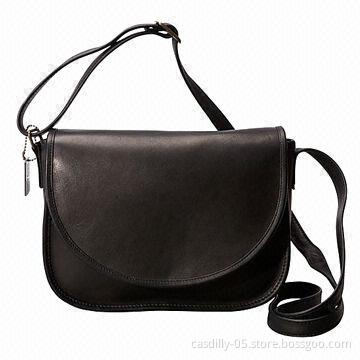 Crossbody bag with magnetic snap closure